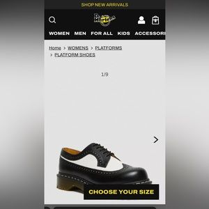 Black and white wing top Oxford shoes